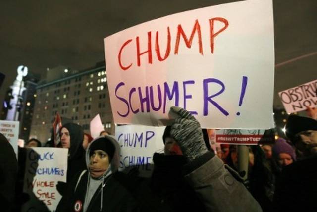 Protesters in Brooklyn's Grand Army Plaza last January calling on Schumer to mount a more vigorous opposition to Trump agenda